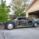 The car with its new roof and rear quarter panels attached—and only its rear quarter panels. It’s a pretty cool view of the “space frame” used in Saturns of the era.